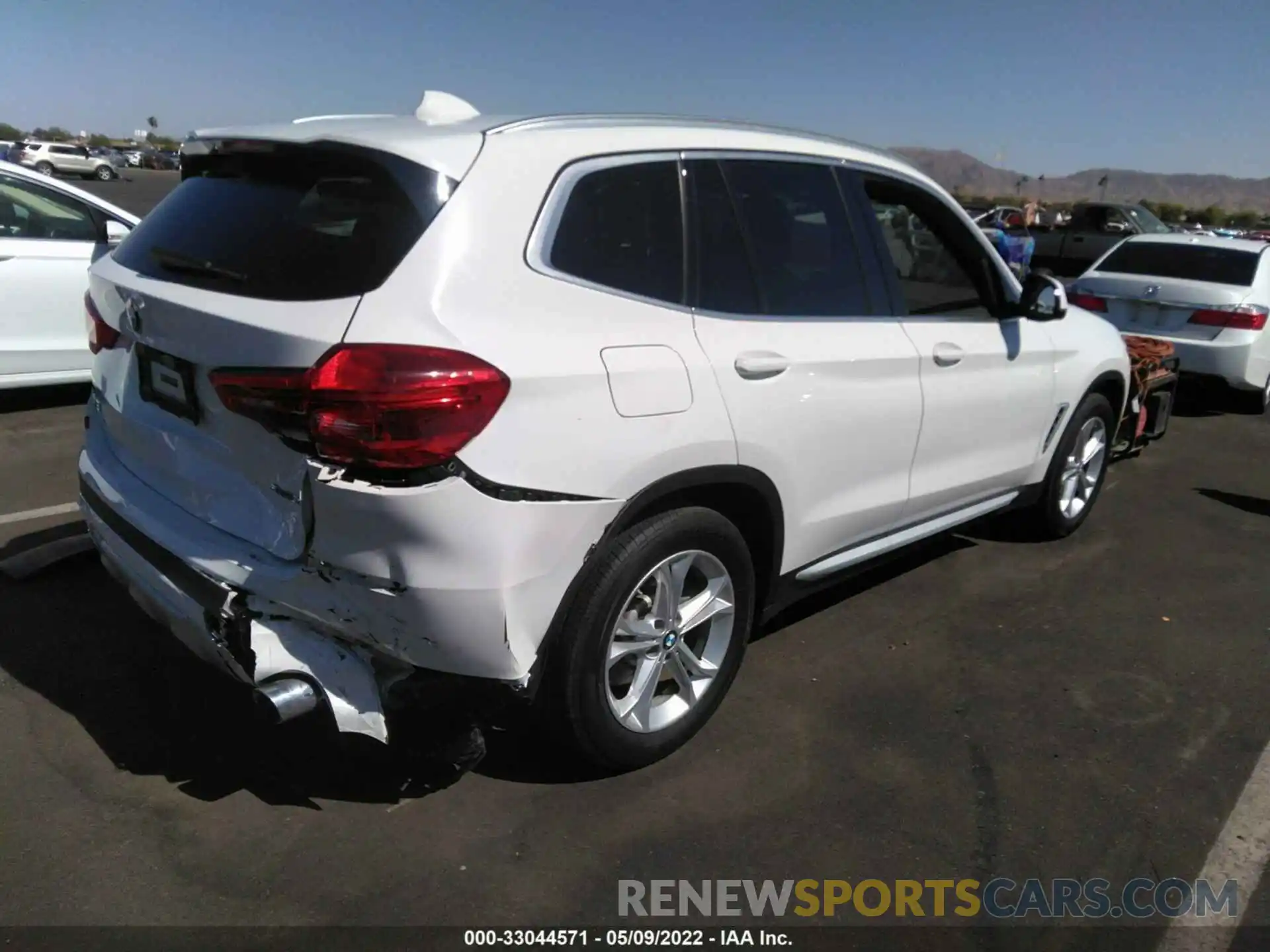 4 Photograph of a damaged car 5UXTR7C5XKLF26030 BMW X3 2019