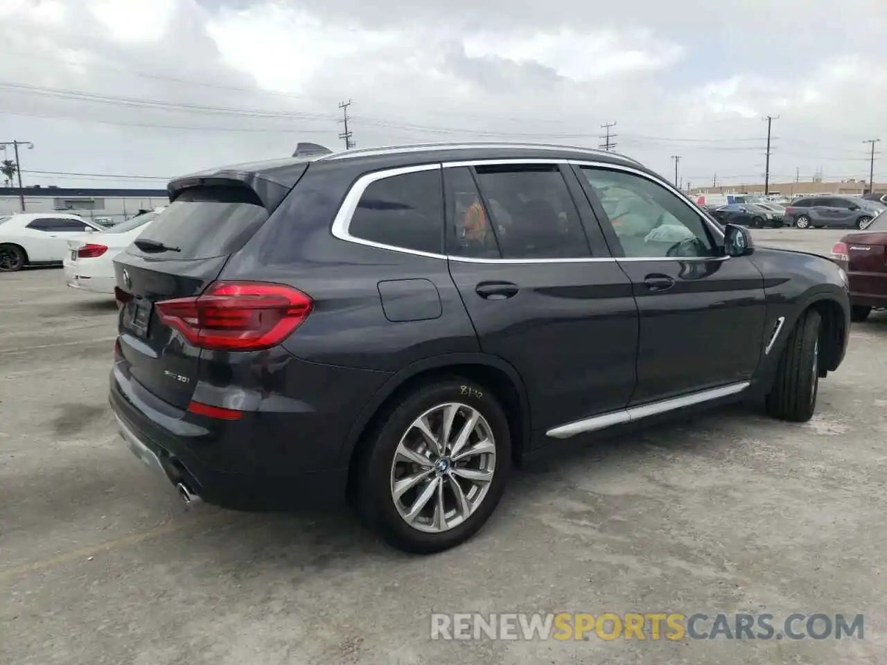 4 Photograph of a damaged car 5UXTR7C5XKLF26805 BMW X3 2019