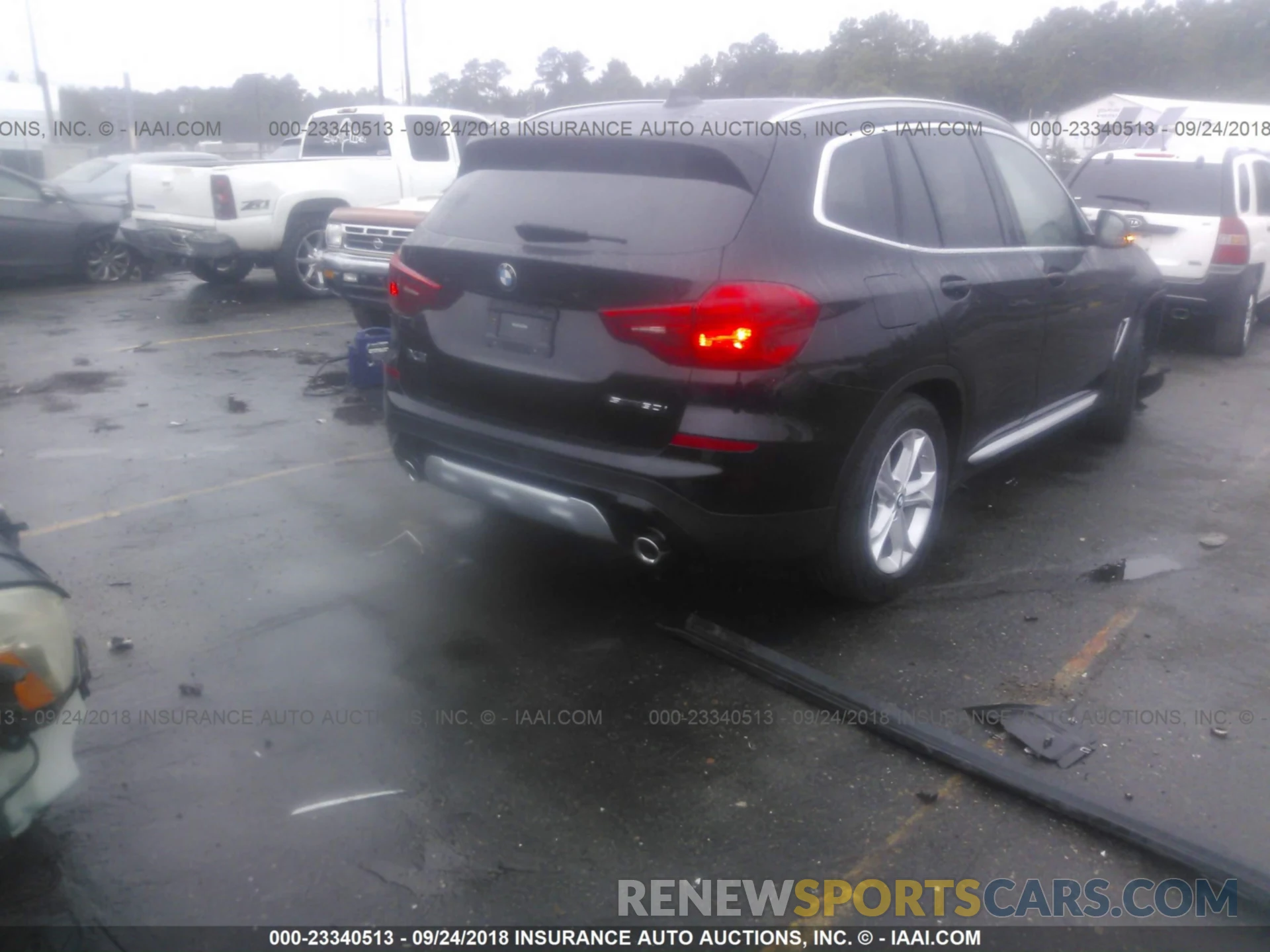 4 Photograph of a damaged car 5UXTR7C5XKLF27128 Bmw X3 2019