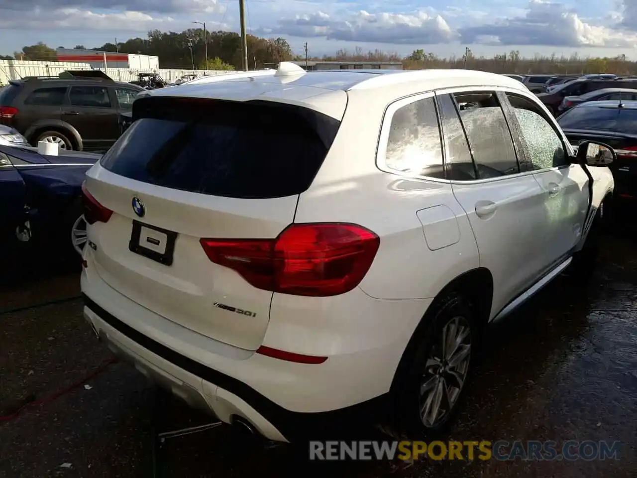 4 Photograph of a damaged car 5UXTR7C5XKLF30157 BMW X3 2019