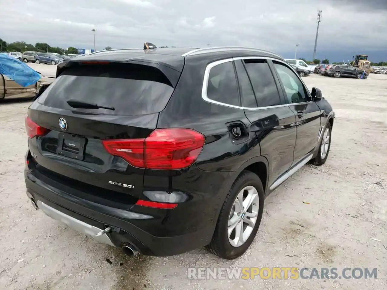 4 Photograph of a damaged car 5UXTR7C5XKLF30417 BMW X3 2019