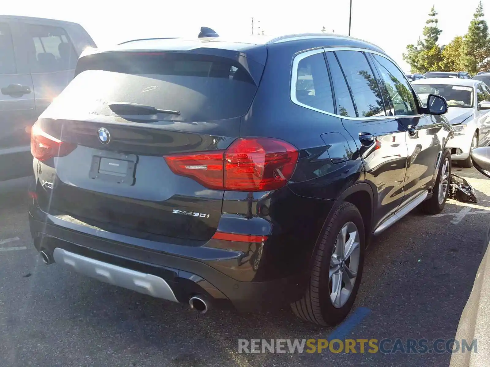 4 Photograph of a damaged car 5UXTR7C5XKLF32099 BMW X3 2019