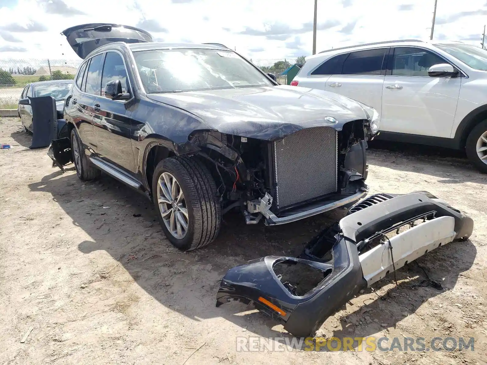 1 Photograph of a damaged car 5UXTR7C5XKLF33978 BMW X3 2019