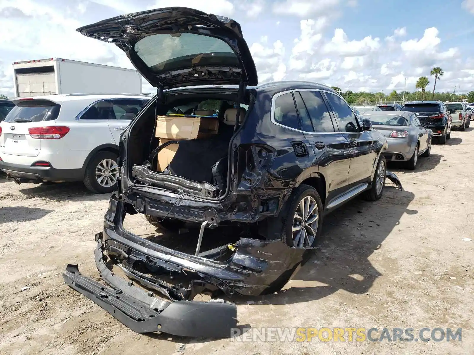 4 Photograph of a damaged car 5UXTR7C5XKLF33978 BMW X3 2019