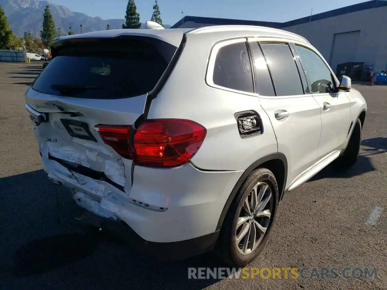 4 Photograph of a damaged car 5UXTR7C5XKLF34144 BMW X3 2019