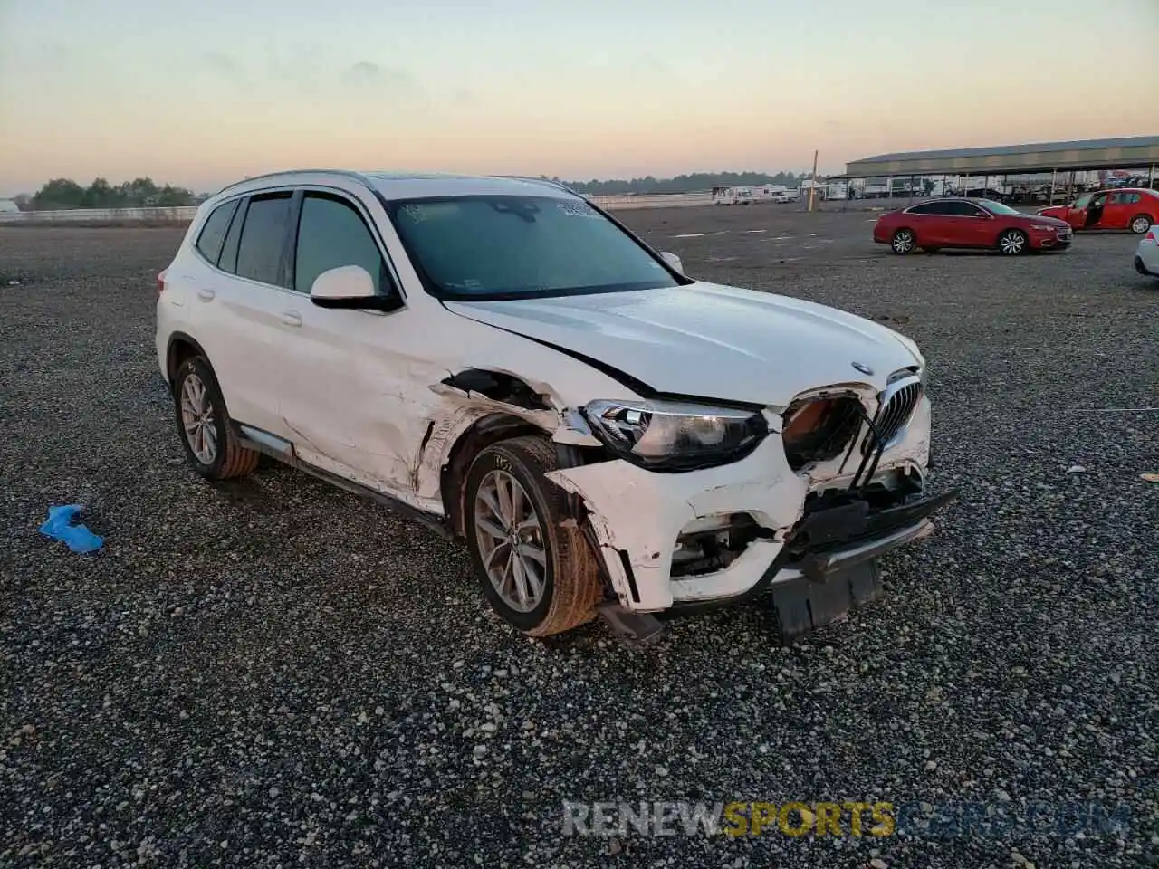 1 Photograph of a damaged car 5UXTR7C5XKLF36072 BMW X3 2019