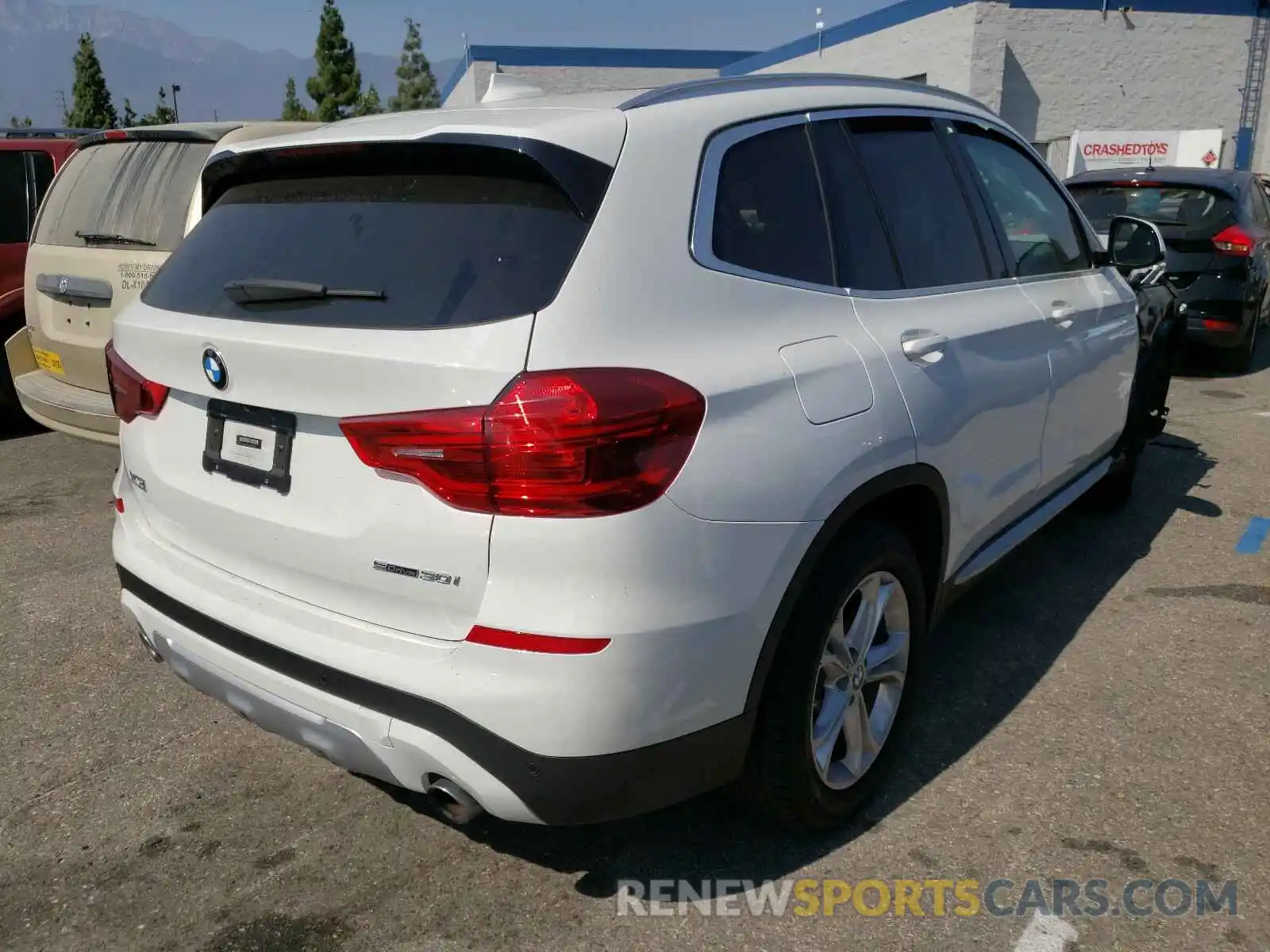 4 Photograph of a damaged car 5UXTR7C5XKLF37786 BMW X3 2019