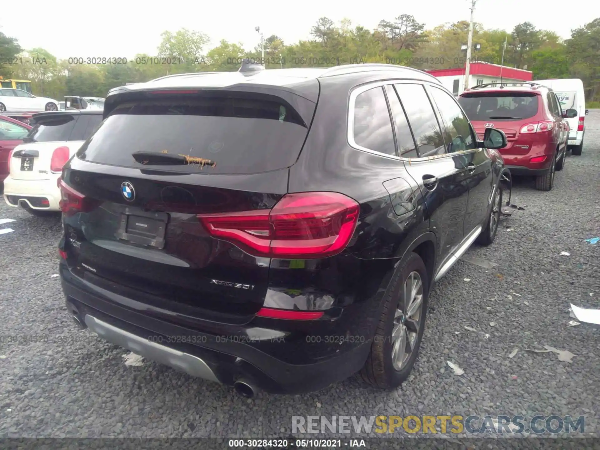 4 Photograph of a damaged car 5UXTR9C50KLD98716 BMW X3 2019