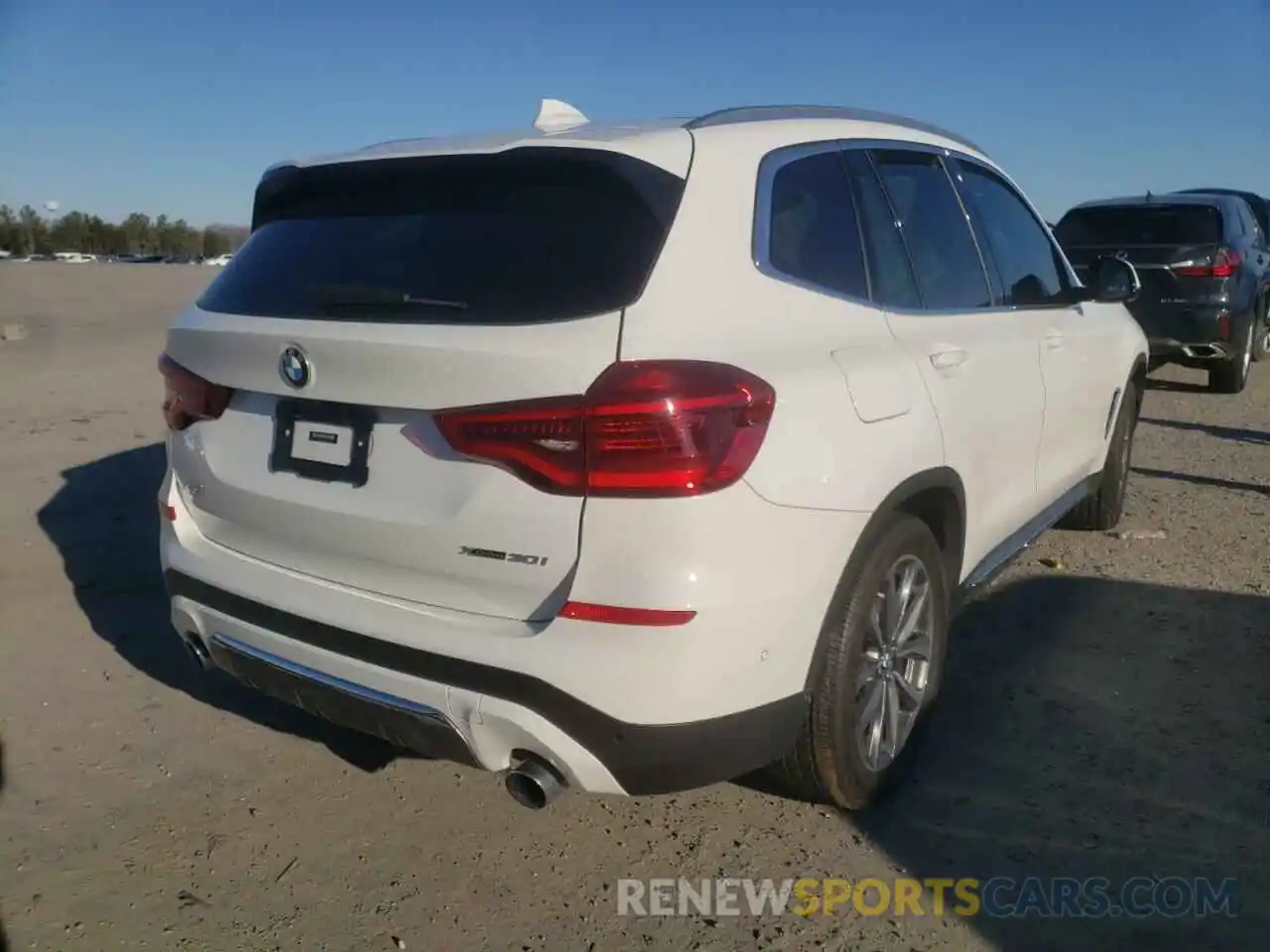 4 Photograph of a damaged car 5UXTR9C51KLP96577 BMW X3 2019