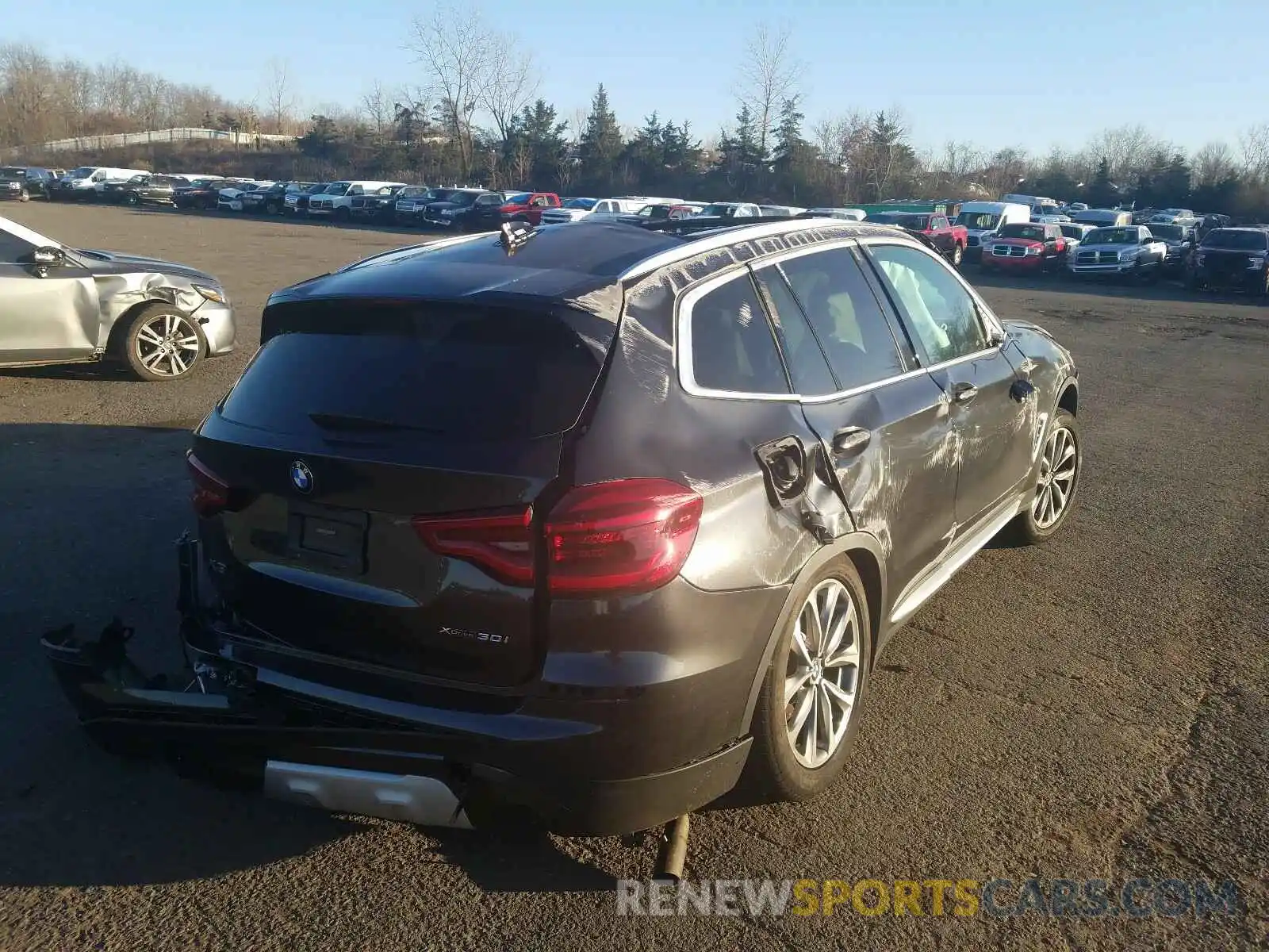 4 Photograph of a damaged car 5UXTR9C52KLP87676 BMW X3 2019