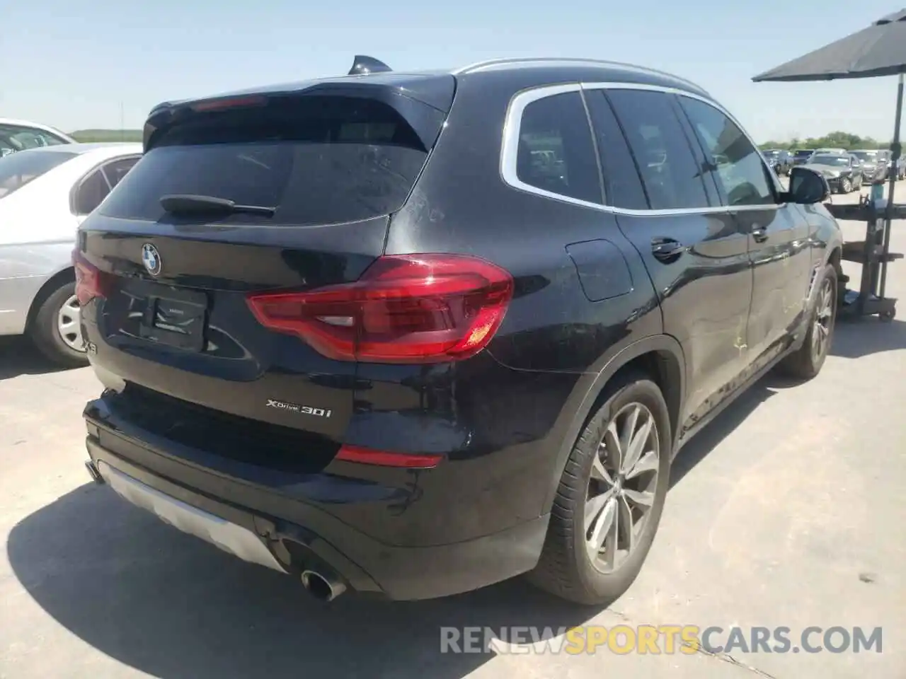 4 Photograph of a damaged car 5UXTR9C53KLP97410 BMW X3 2019