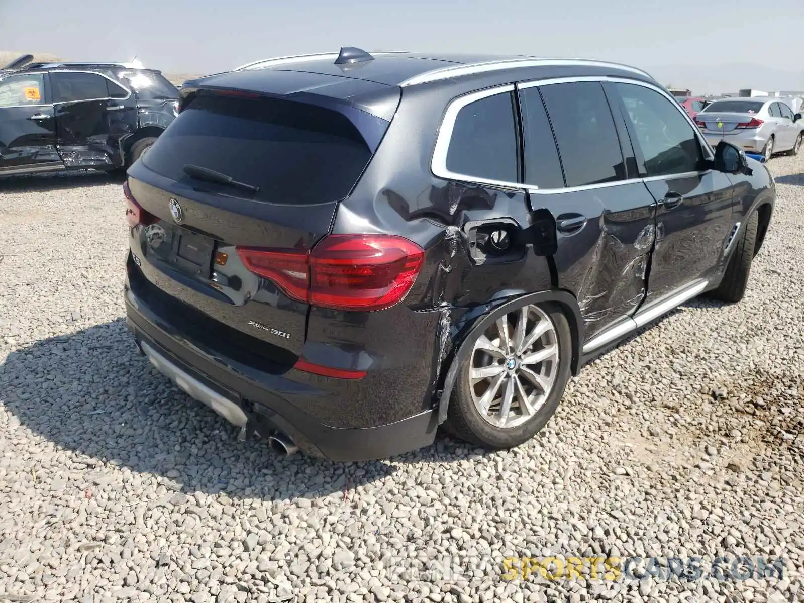 4 Photograph of a damaged car 5UXTR9C54KLD97519 BMW X3 2019