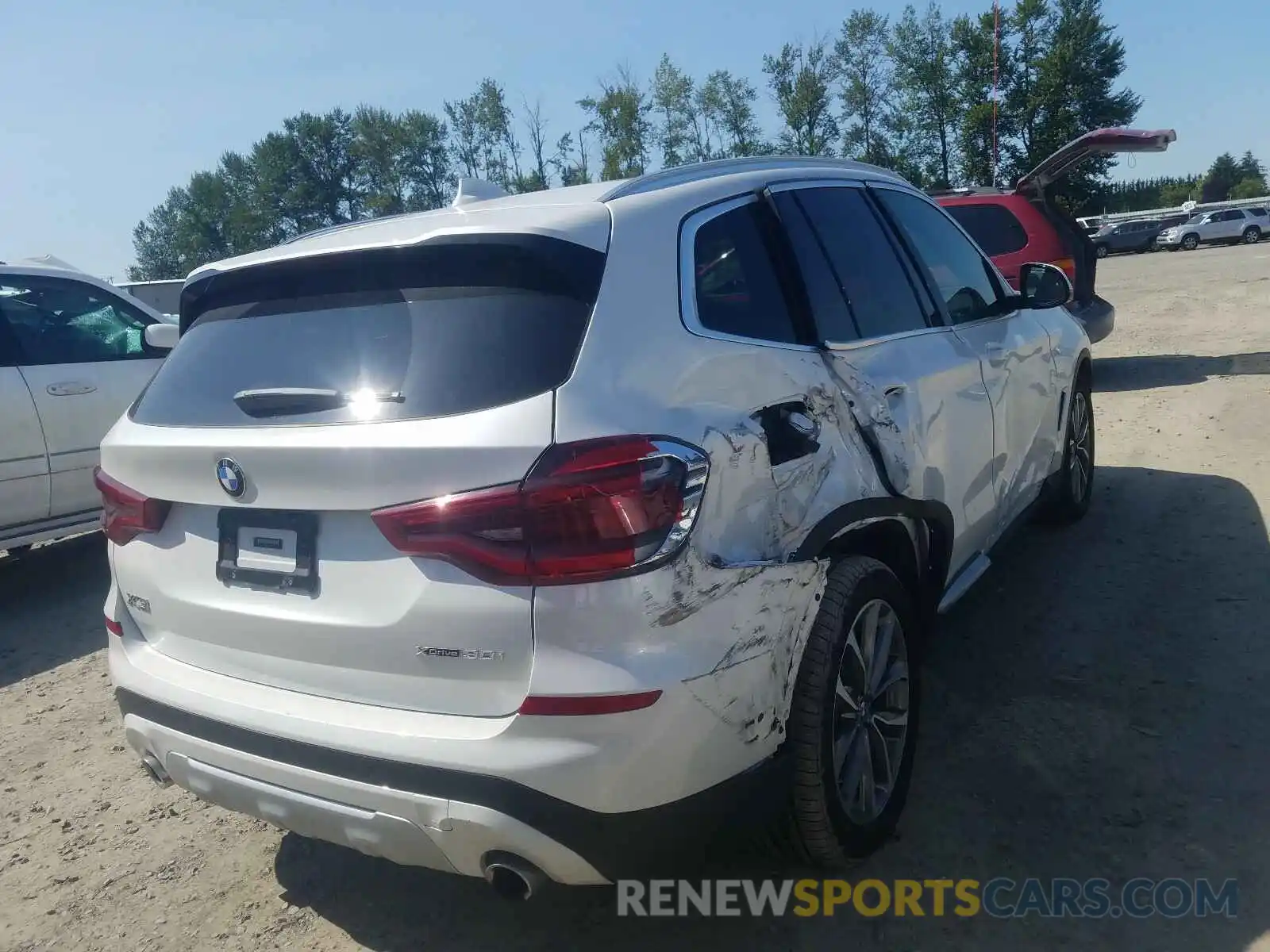 4 Photograph of a damaged car 5UXTR9C54KLE18482 BMW X3 2019