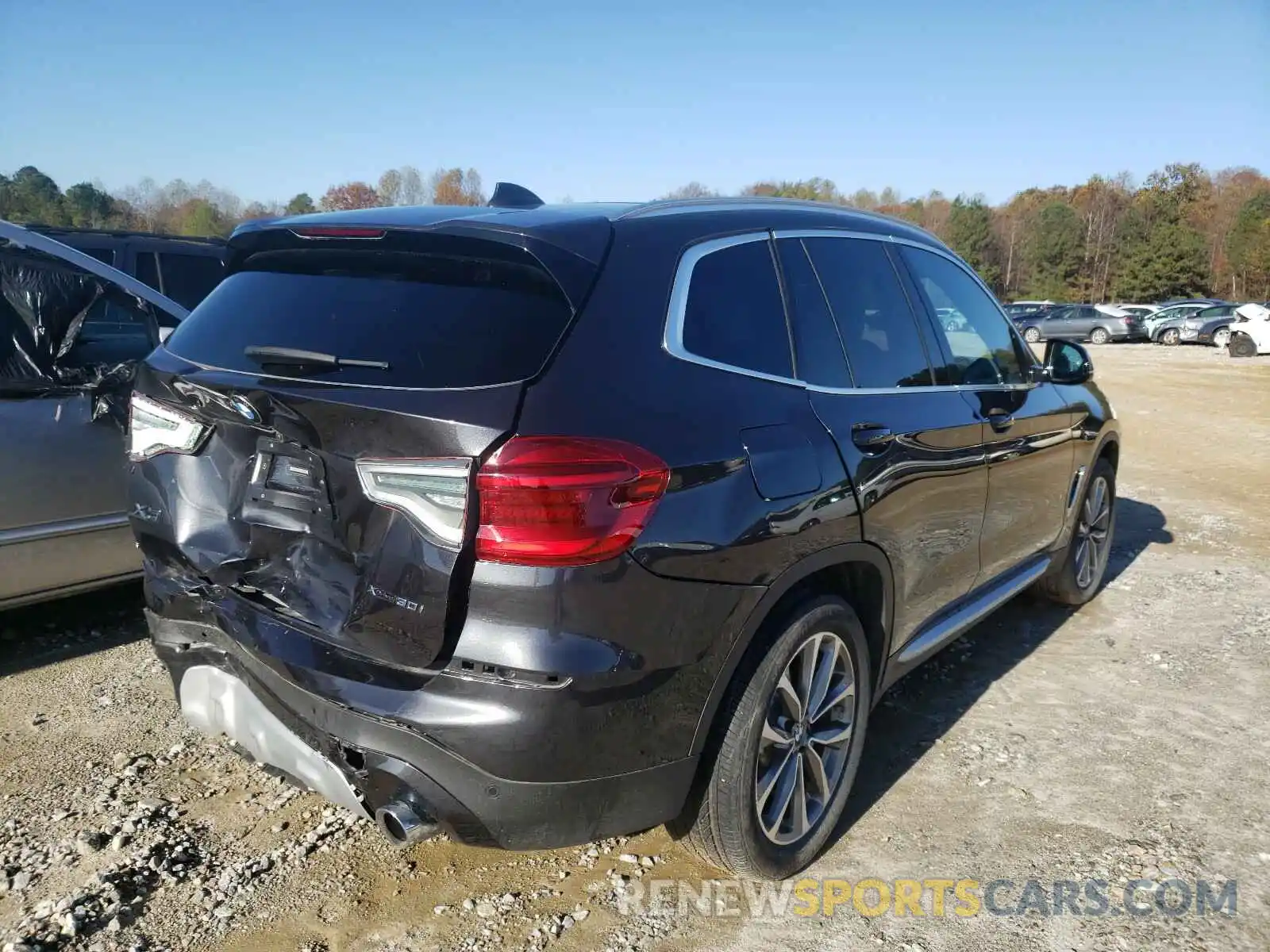 4 Photograph of a damaged car 5UXTR9C54KLP84536 BMW X3 2019