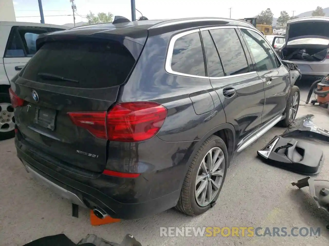 4 Photograph of a damaged car 5UXTR9C54KLP85637 BMW X3 2019