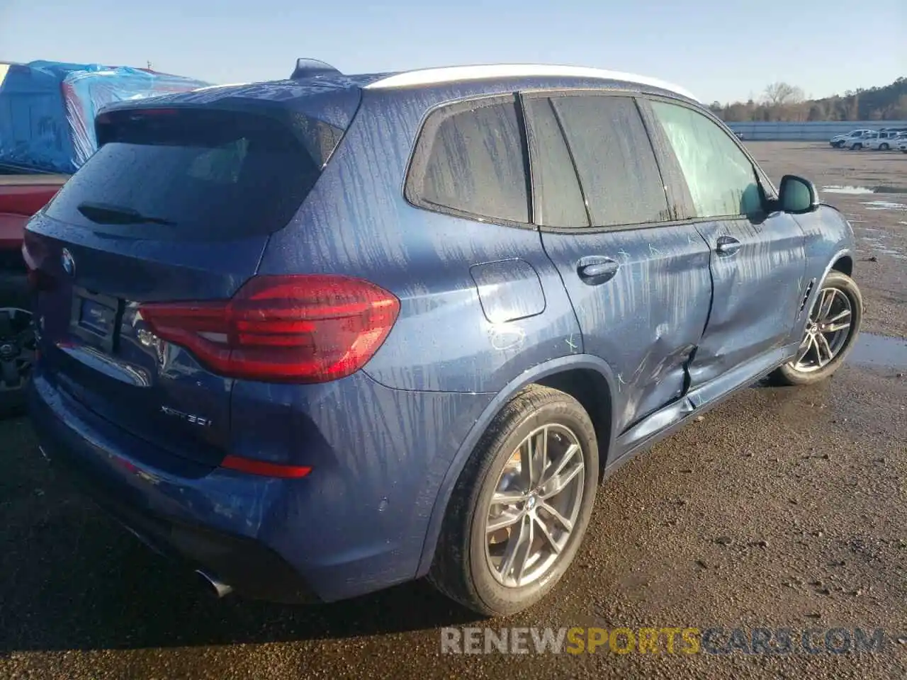 4 Photograph of a damaged car 5UXTR9C55KLP89728 BMW X3 2019