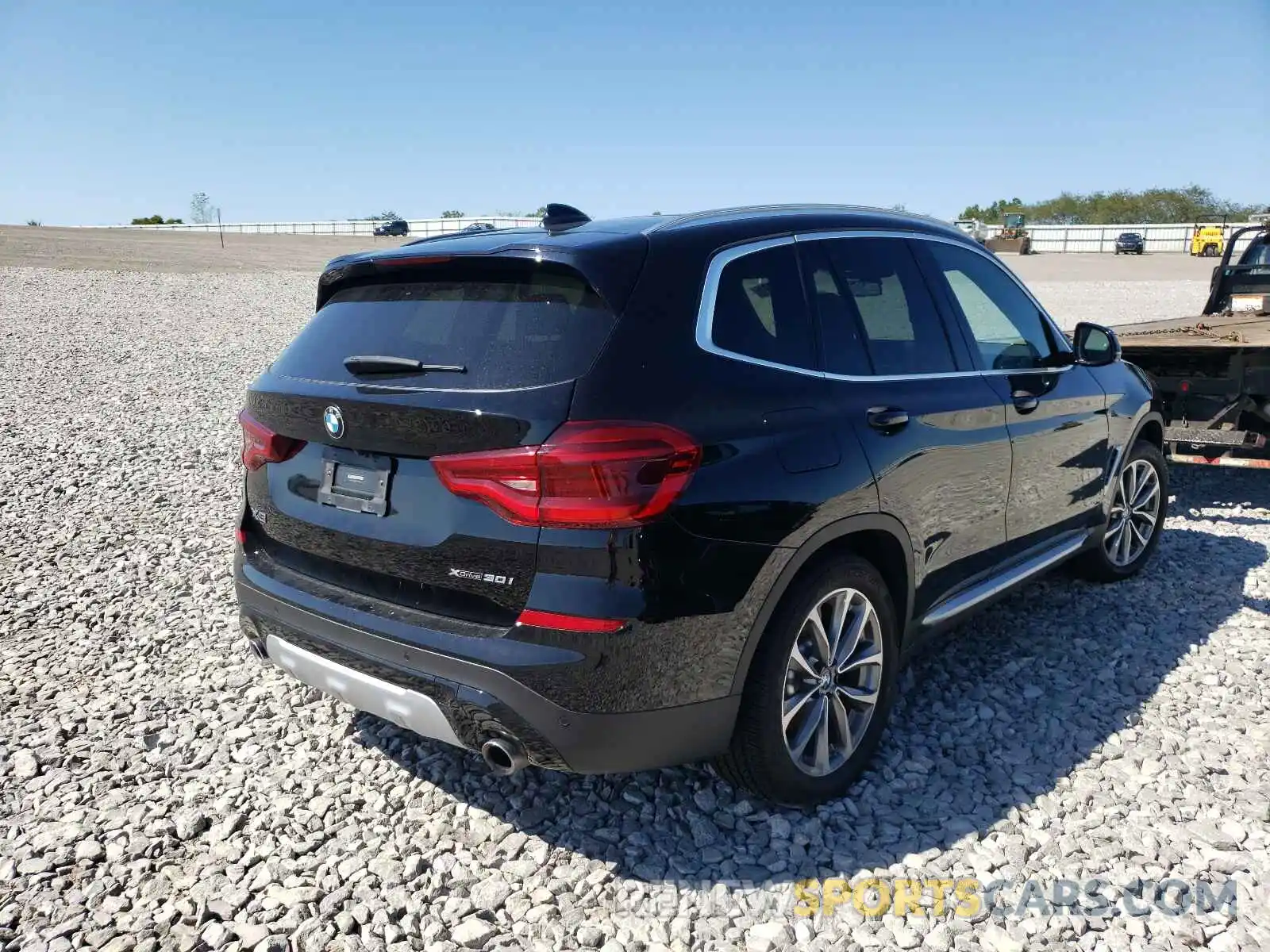 4 Photograph of a damaged car 5UXTR9C55KLP94069 BMW X3 2019