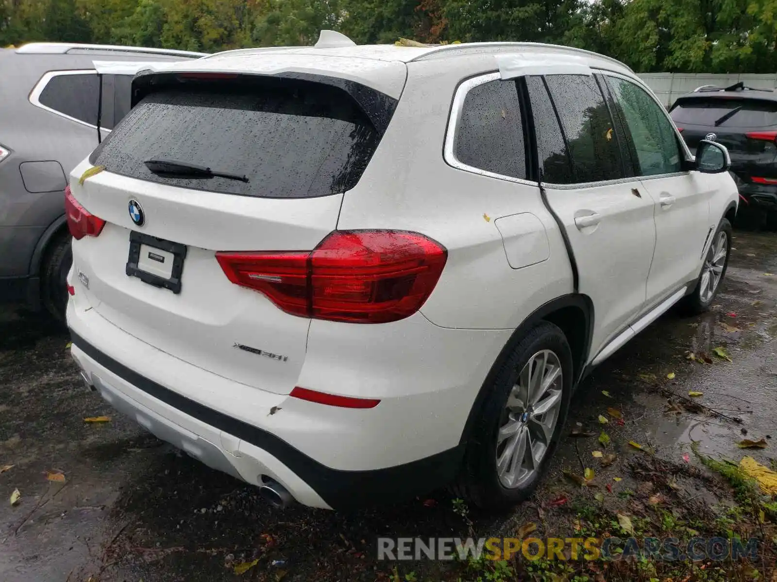 4 Photograph of a damaged car 5UXTR9C56KLP77989 BMW X3 2019