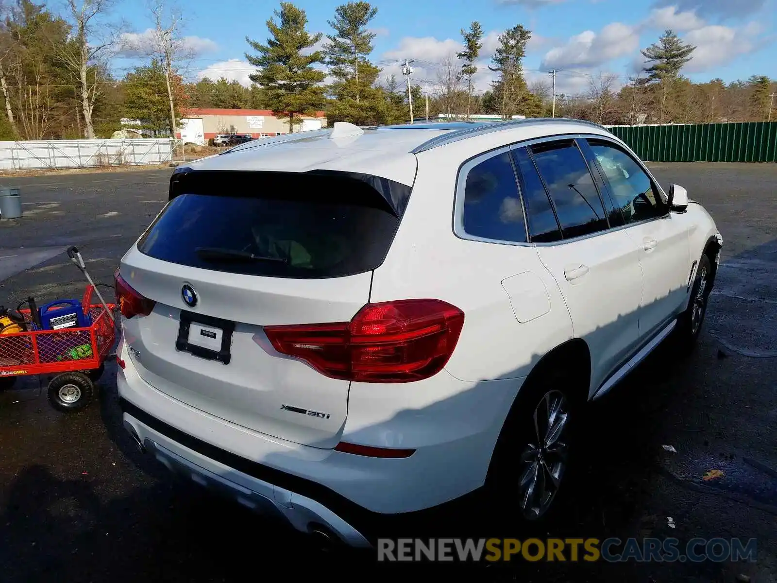 4 Photograph of a damaged car 5UXTR9C56KLP86398 BMW X3 2019