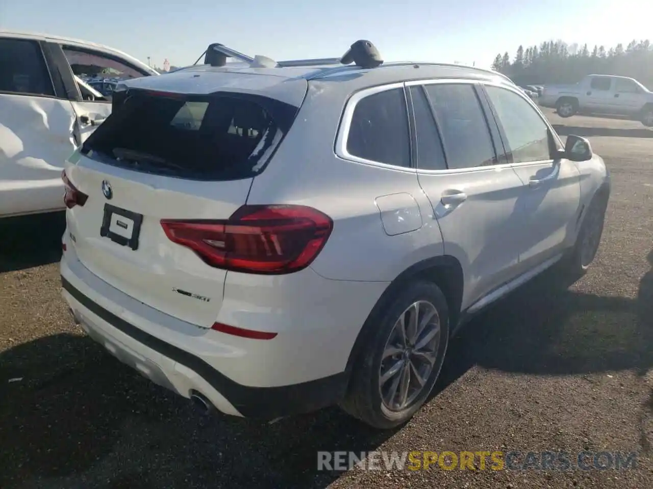 4 Photograph of a damaged car 5UXTR9C56KLP86479 BMW X3 2019