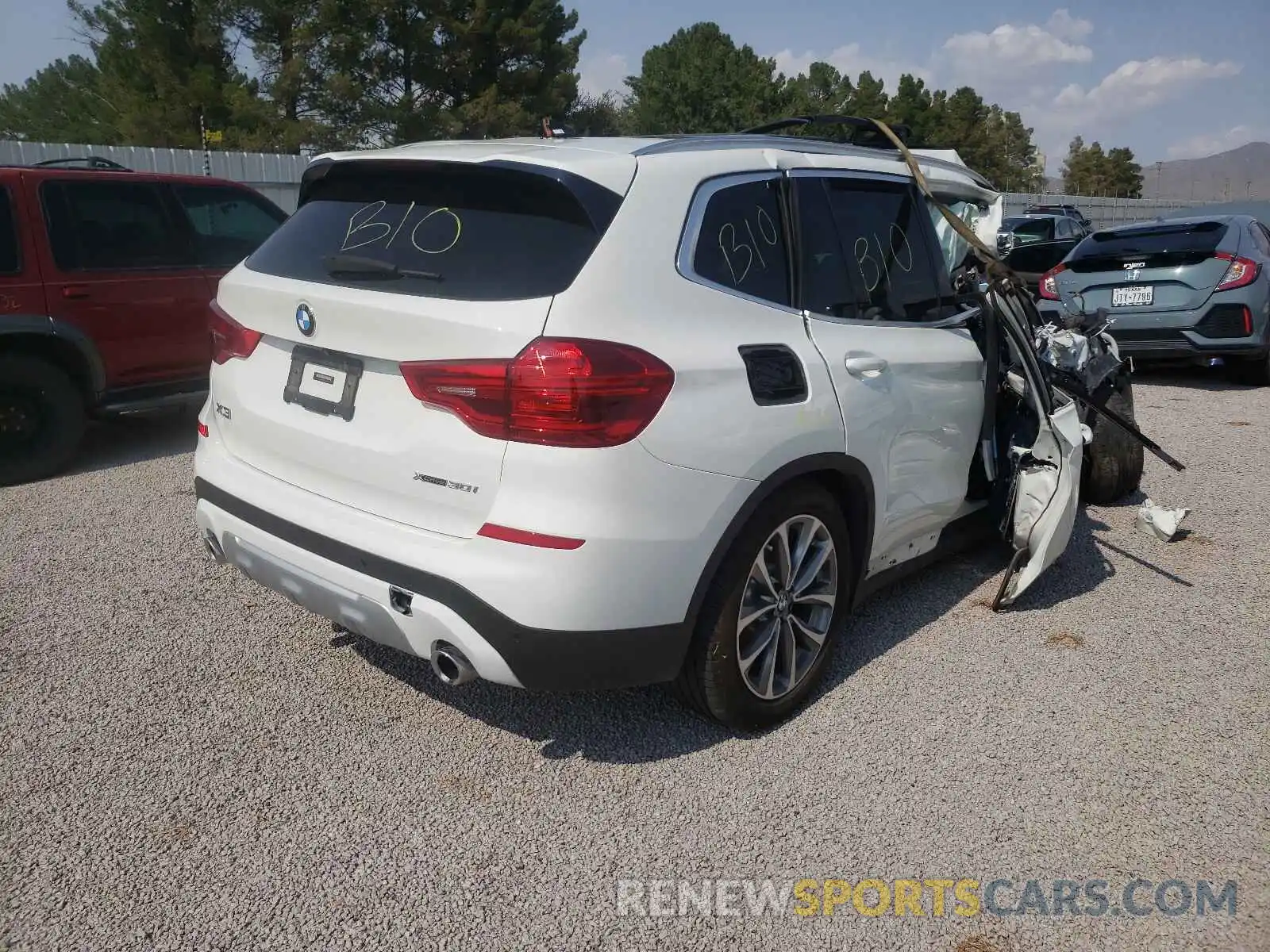 4 Photograph of a damaged car 5UXTR9C56KLP88149 BMW X3 2019