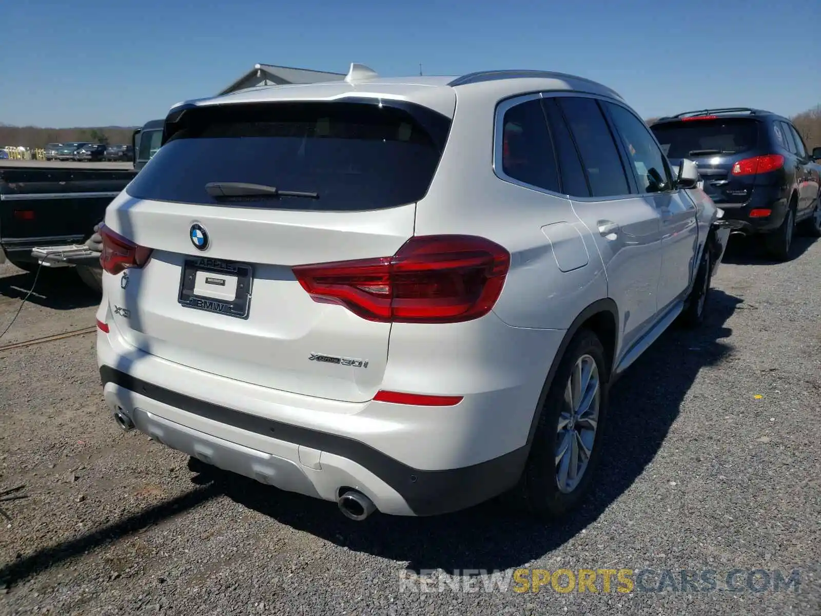 4 Photograph of a damaged car 5UXTR9C56KLR04742 BMW X3 2019