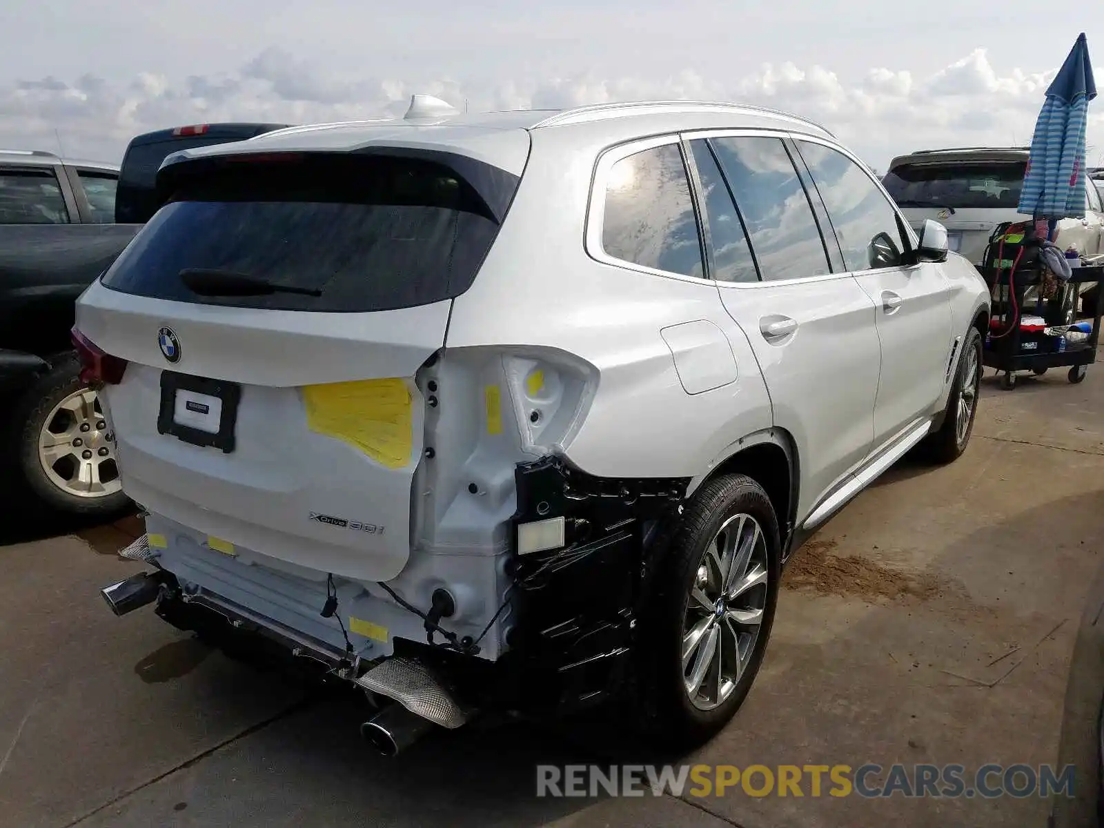 4 Photograph of a damaged car 5UXTR9C57KLP77936 BMW X3 2019