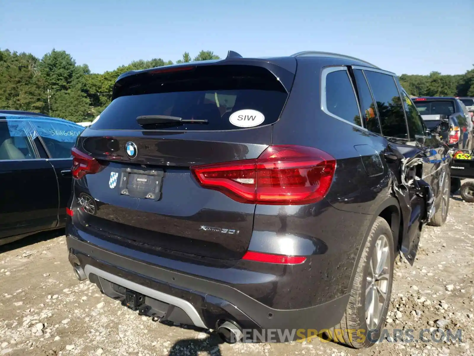 4 Photograph of a damaged car 5UXTR9C57KLP87379 BMW X3 2019