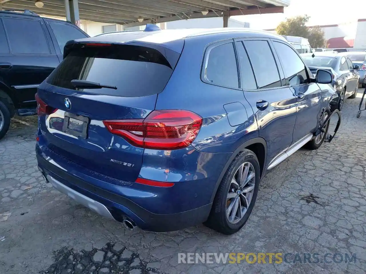 4 Photograph of a damaged car 5UXTR9C57KLP88807 BMW X3 2019