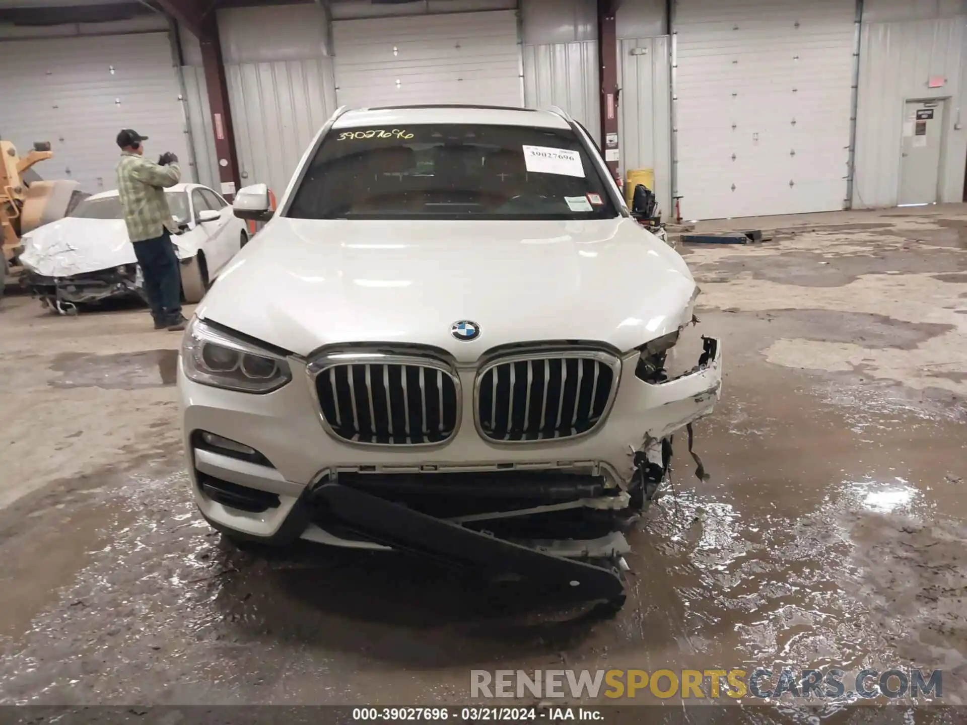 12 Photograph of a damaged car 5UXTR9C58KLD95949 BMW X3 2019