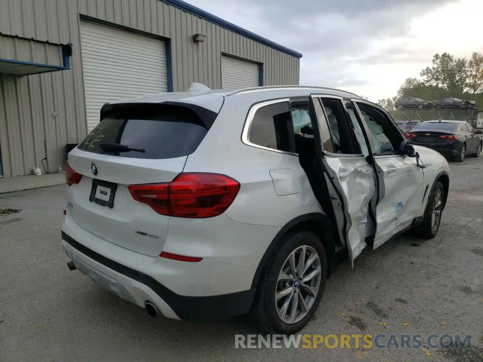 4 Photograph of a damaged car 5UXTR9C58KLE13690 BMW X3 2019