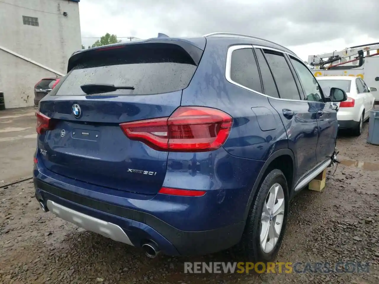 4 Photograph of a damaged car 5UXTR9C58KLP93188 BMW X3 2019