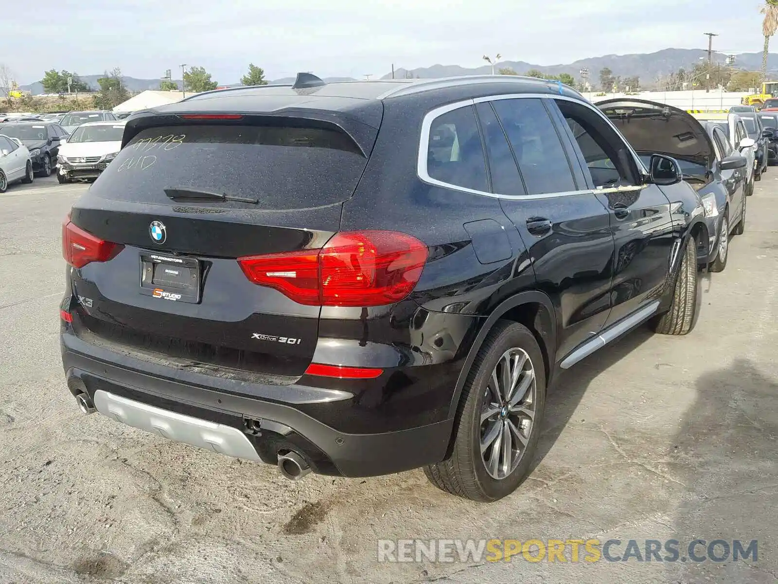 4 Photograph of a damaged car 5UXTR9C58KLP96351 BMW X3 2019