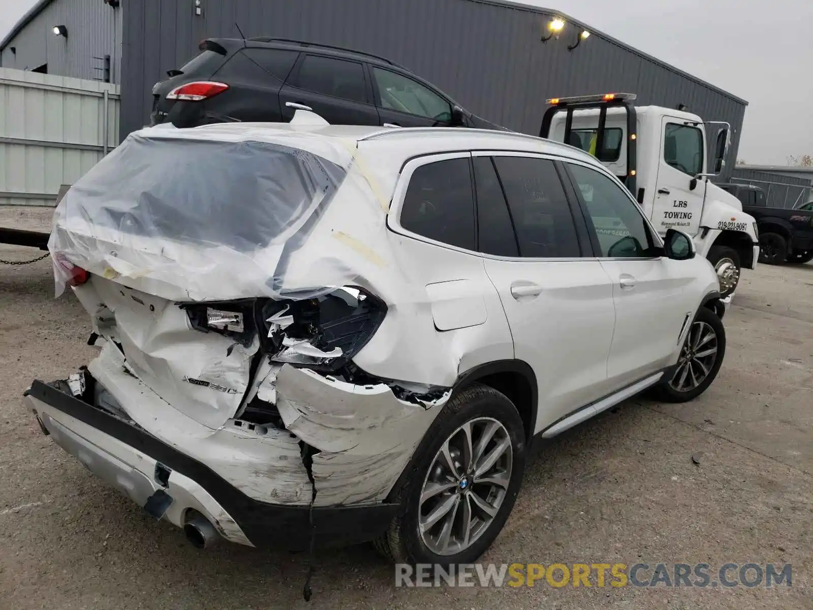 4 Photograph of a damaged car 5UXTR9C59KLE14878 BMW X3 2019