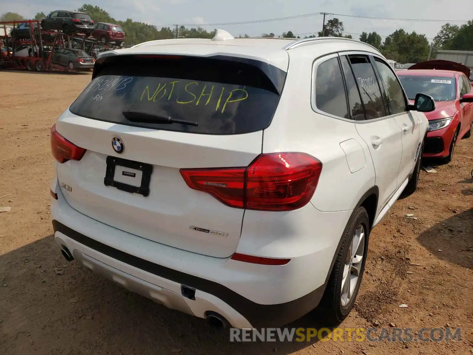 4 Photograph of a damaged car 5UXTR9C59KLE18705 BMW X3 2019