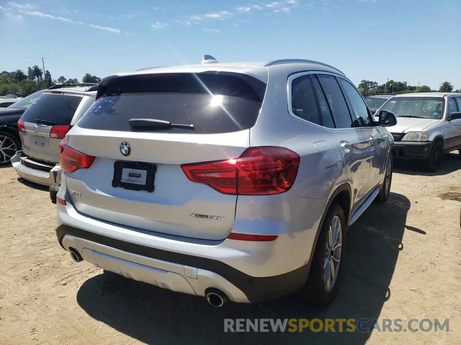 4 Photograph of a damaged car 5UXTR9C59KLE20096 BMW X3 2019