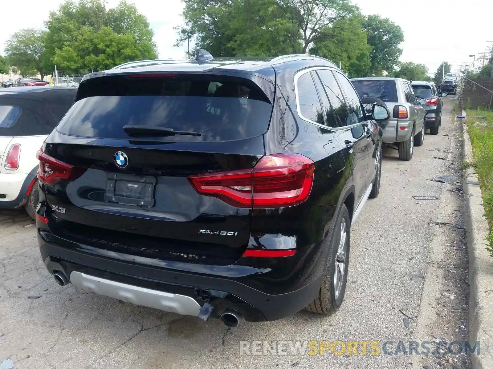 4 Photograph of a damaged car 5UXTR9C59KLP87724 BMW X3 2019