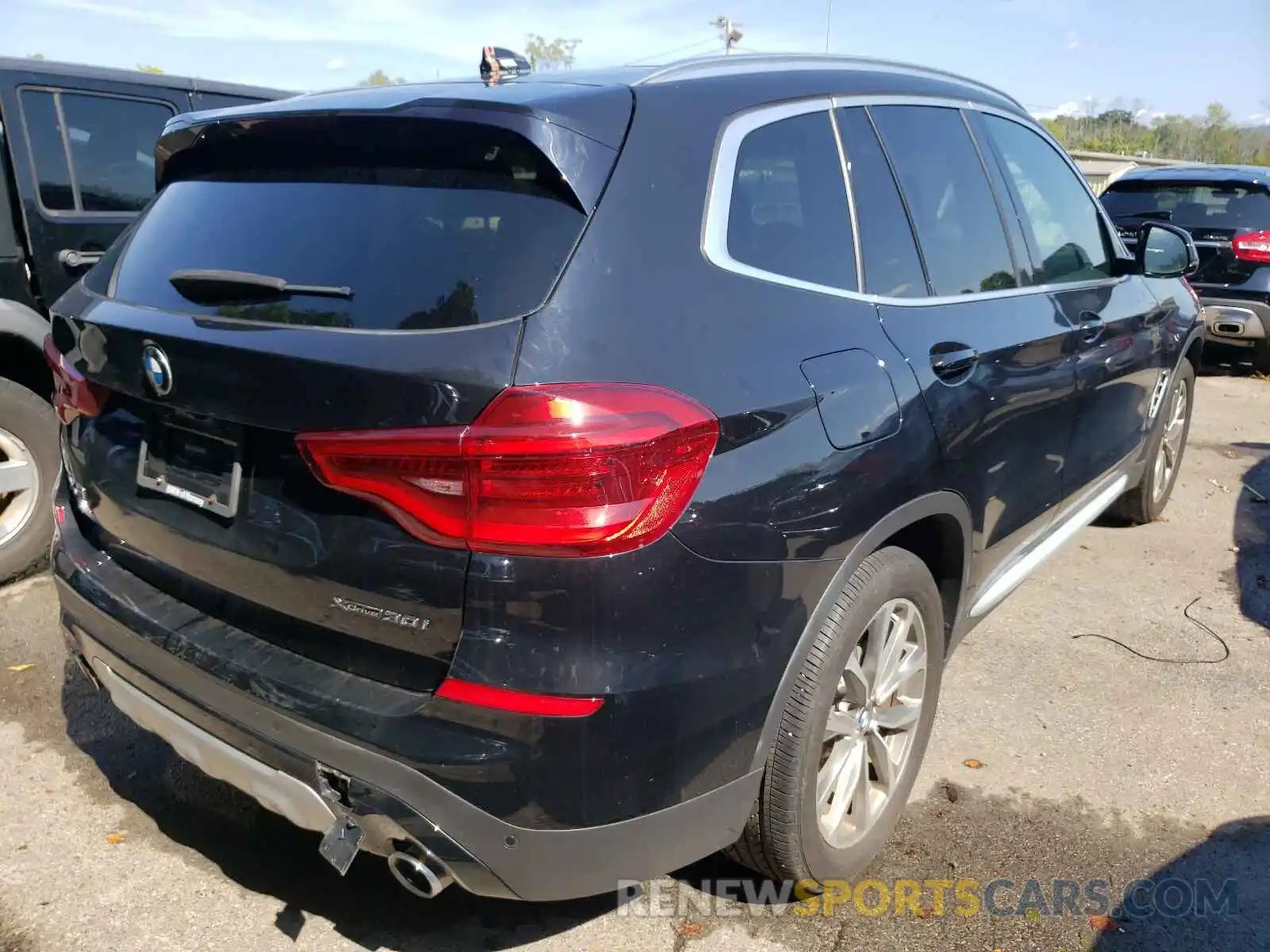 4 Photograph of a damaged car 5UXTR9C59KLP90963 BMW X3 2019