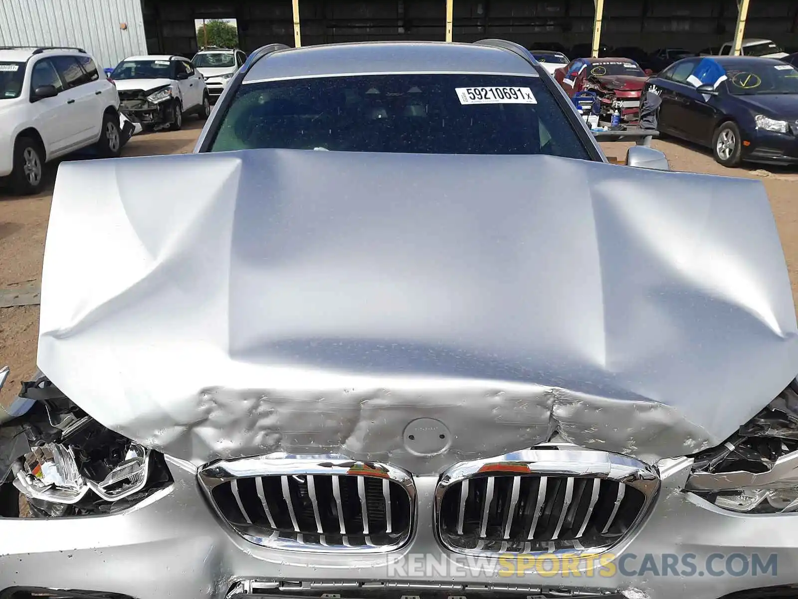 7 Photograph of a damaged car 5UXTR9C5XKLE20303 BMW X3 2019