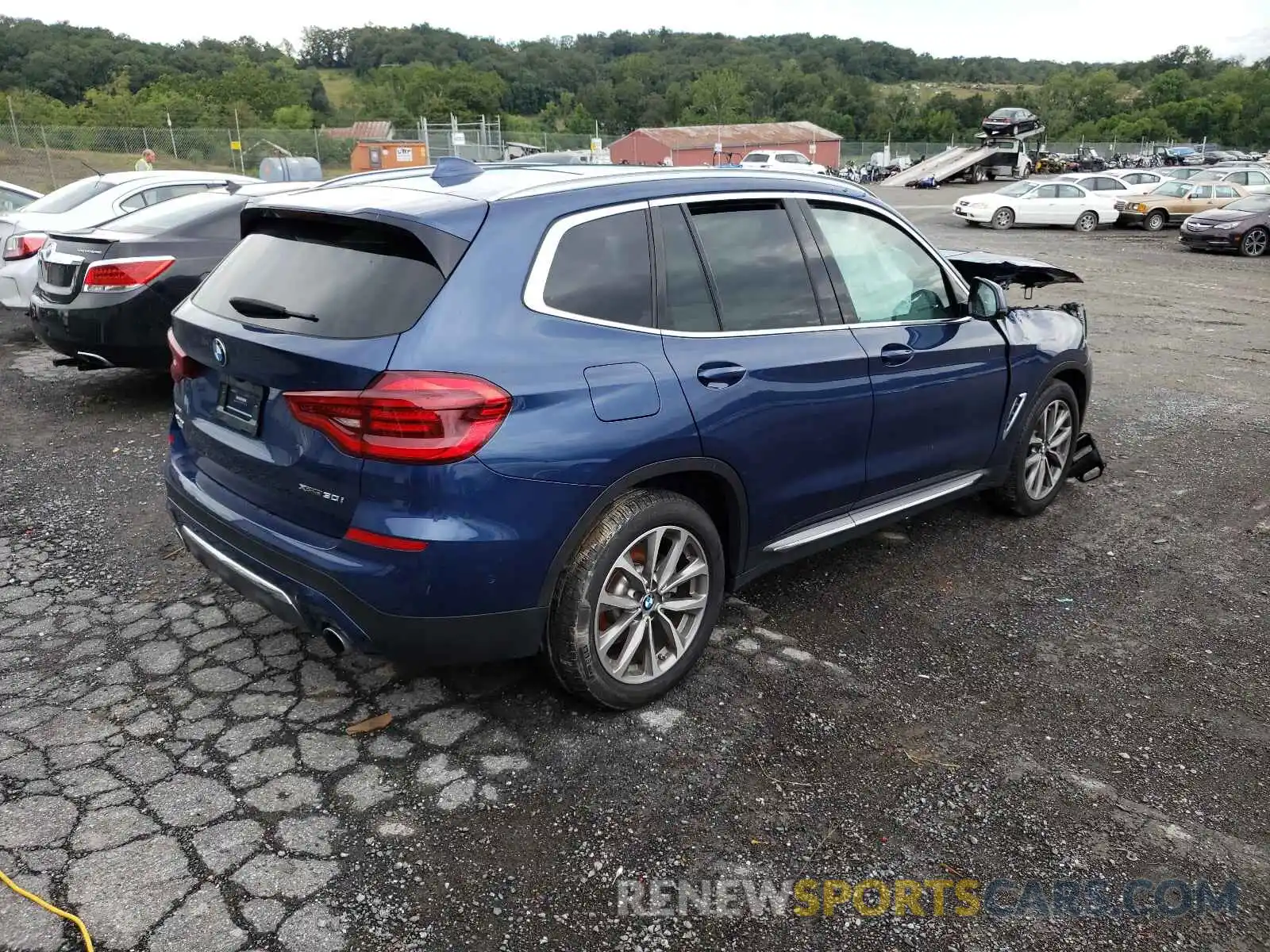 4 Photograph of a damaged car 5UXTR9C5XKLR06882 BMW X3 2019