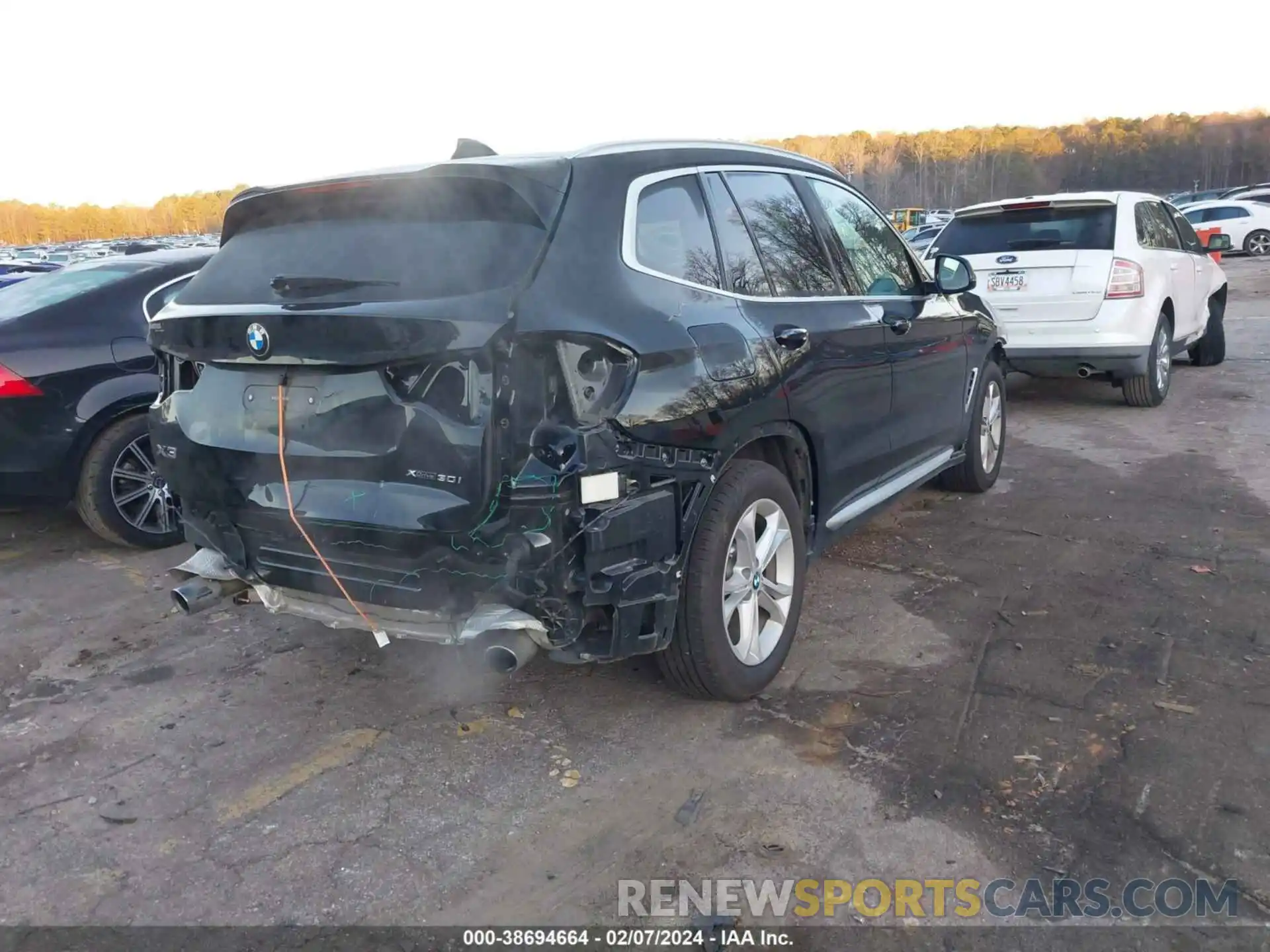 4 Photograph of a damaged car 5UXTY5C00L9B57902 BMW X3 2020