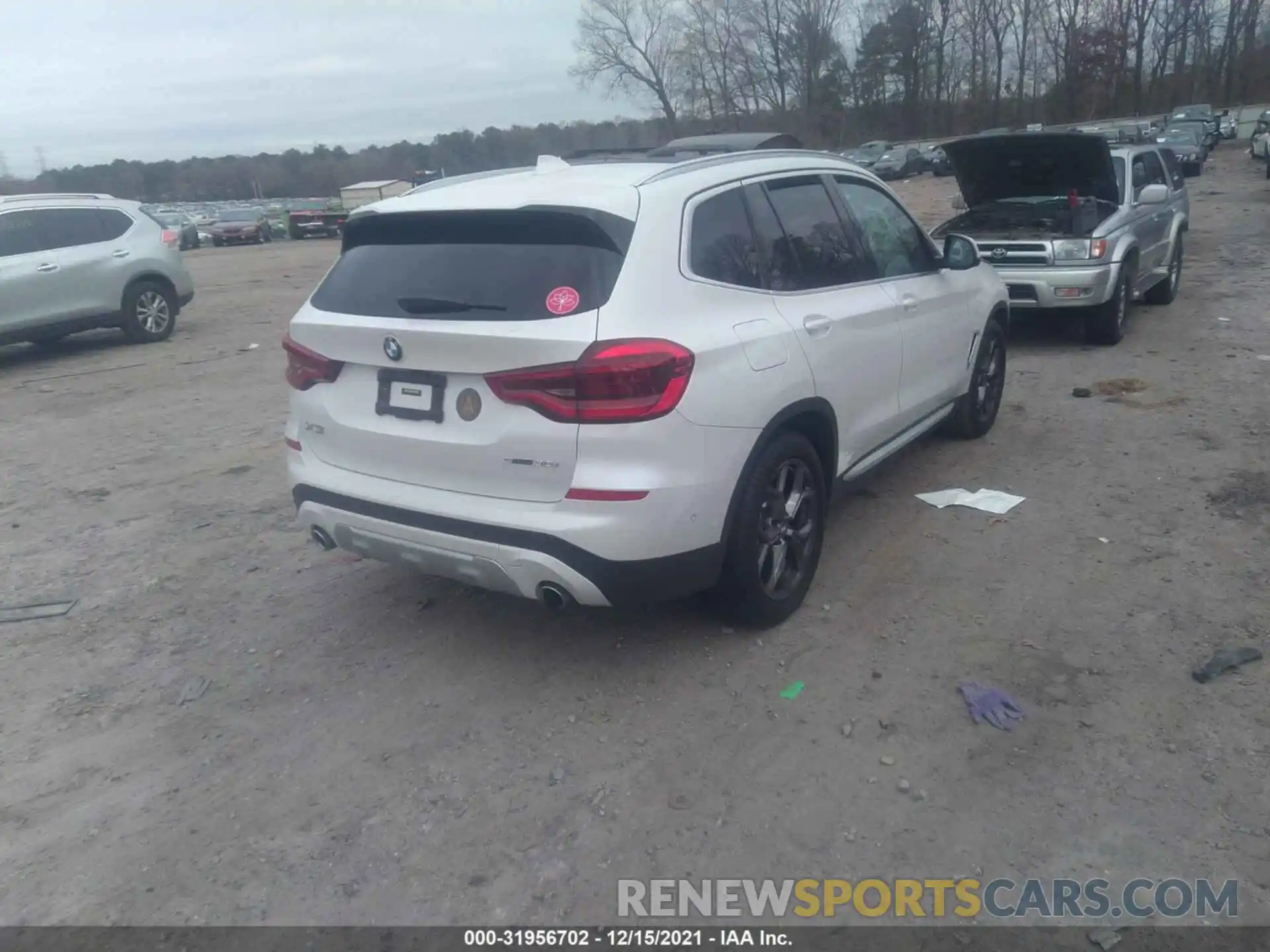 4 Photograph of a damaged car 5UXTY3C09M9H24999 BMW X3 2021