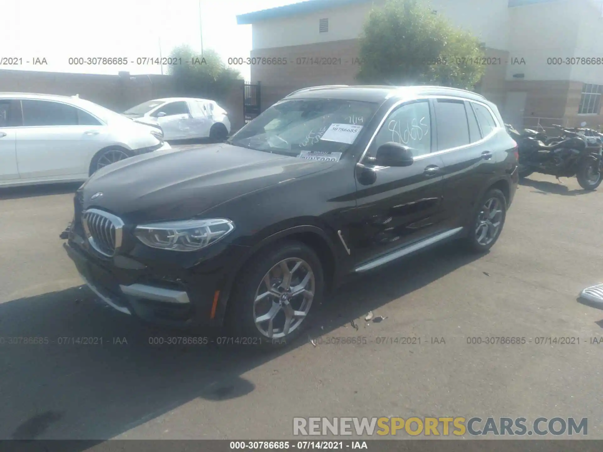 2 Photograph of a damaged car 5UXTY5C00M9F94333 BMW X3 2021