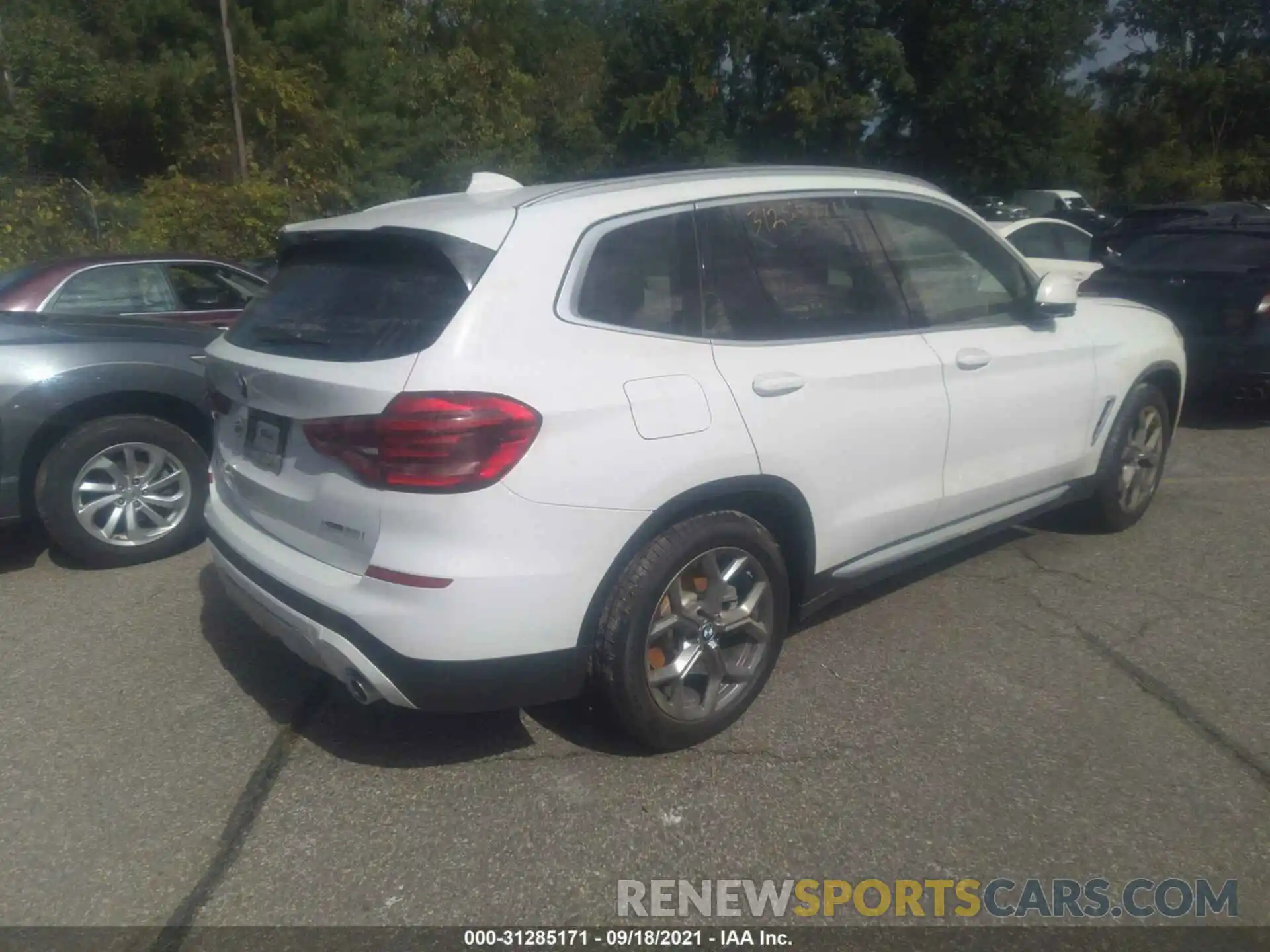 4 Photograph of a damaged car 5UXTY5C00M9H89395 BMW X3 2021