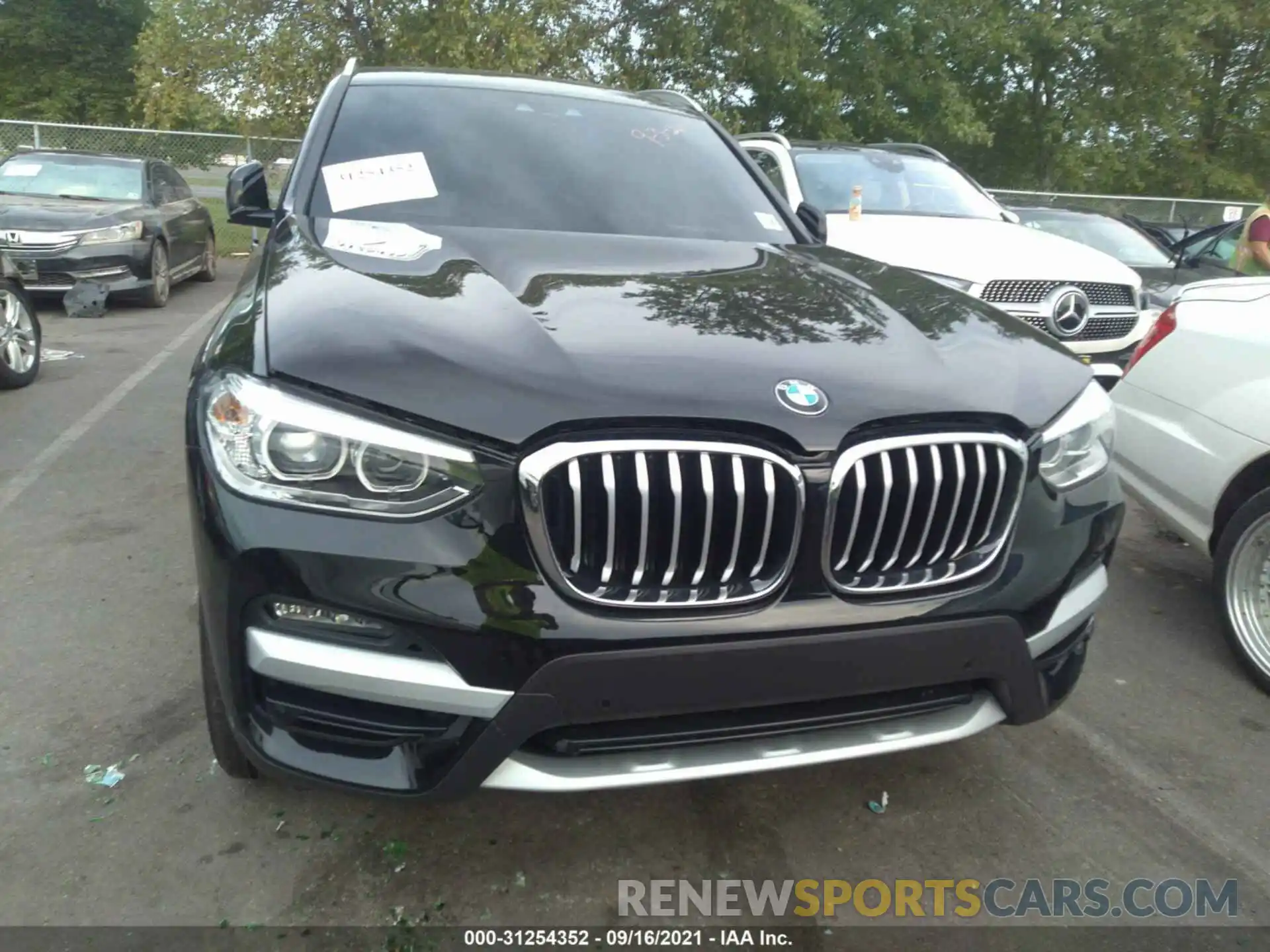 6 Photograph of a damaged car 5UXTY5C03M9F00509 BMW X3 2021