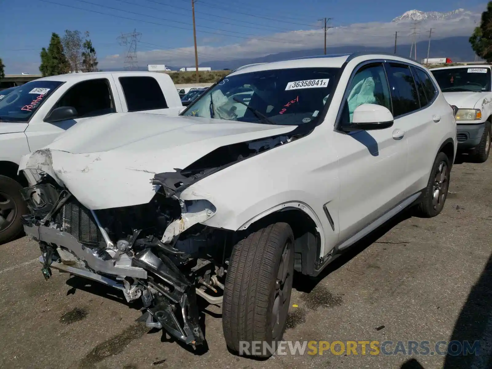 2 Photograph of a damaged car 5UXTY5C0XM9E37392 BMW X3 2021