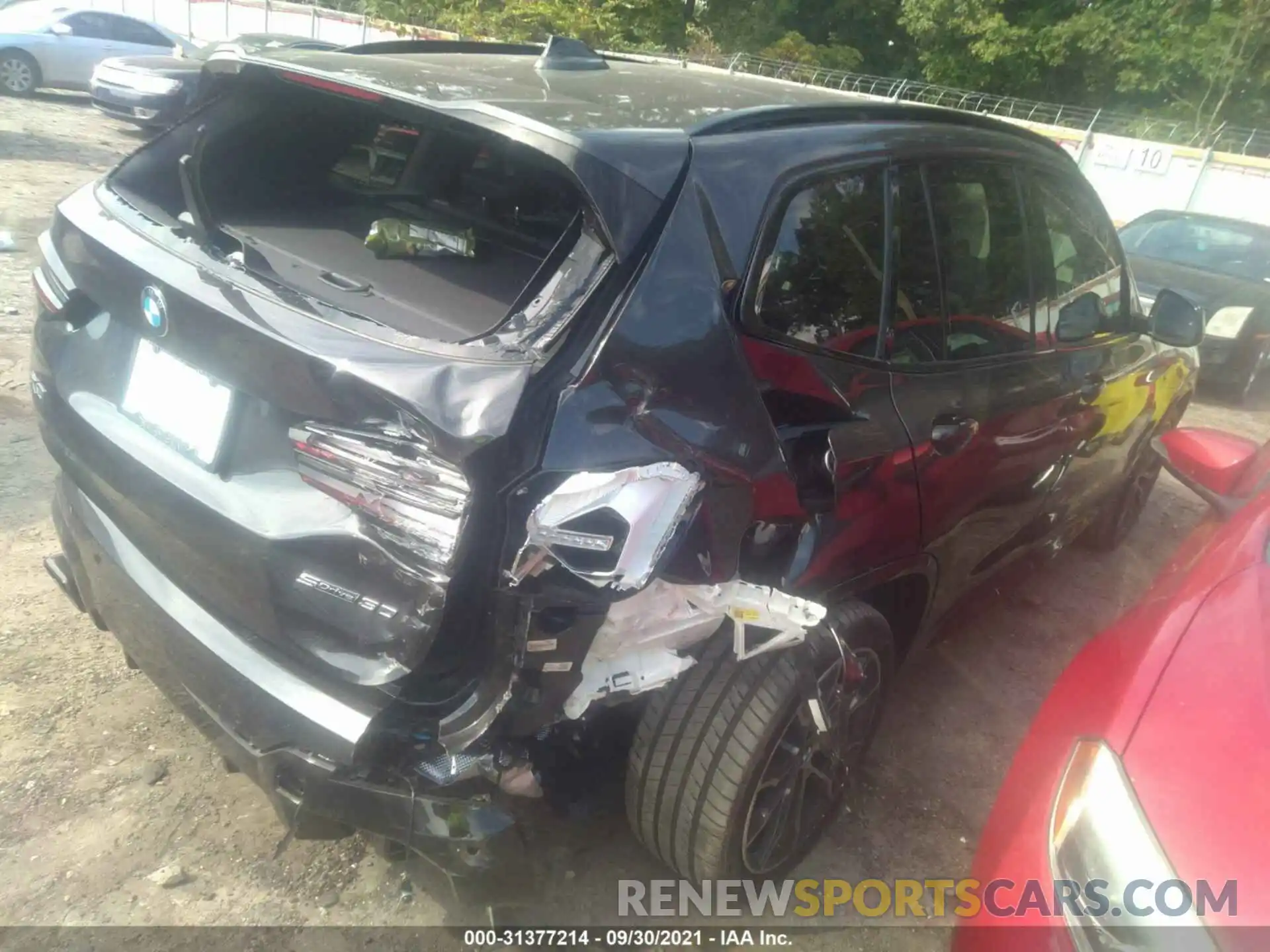 4 Photograph of a damaged car 5UX43DP00N9J26012 BMW X3 2022