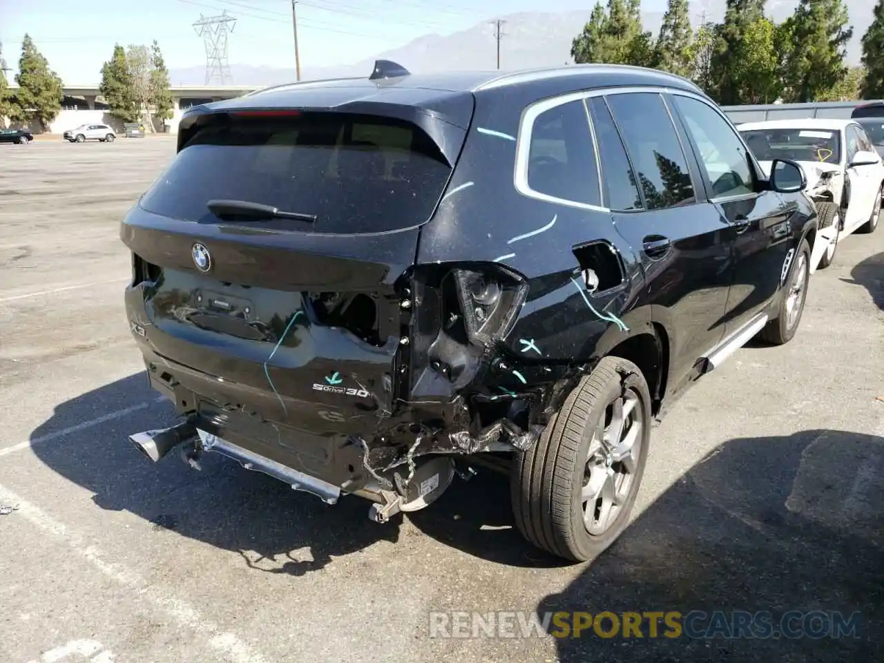 4 Photograph of a damaged car 5UX43DP02N9H47609 BMW X3 2022