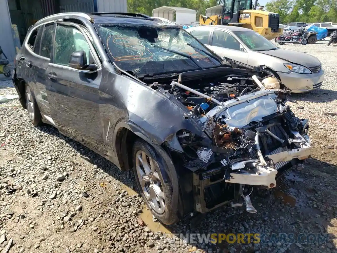 1 Photograph of a damaged car 5UX43DP02N9L20931 BMW X3 2022