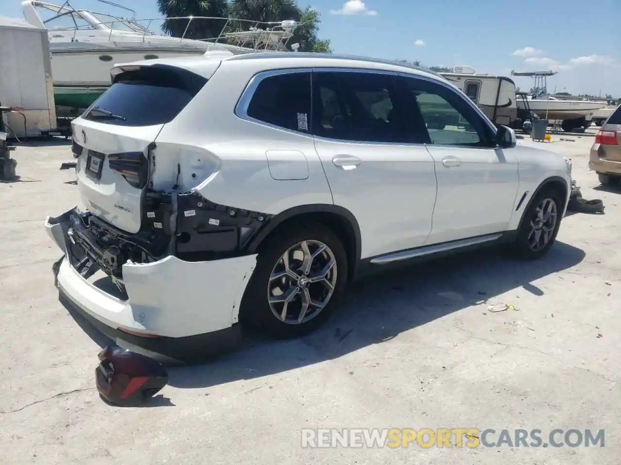 4 Photograph of a damaged car 5UX43DP04N9J67212 BMW X3 2022